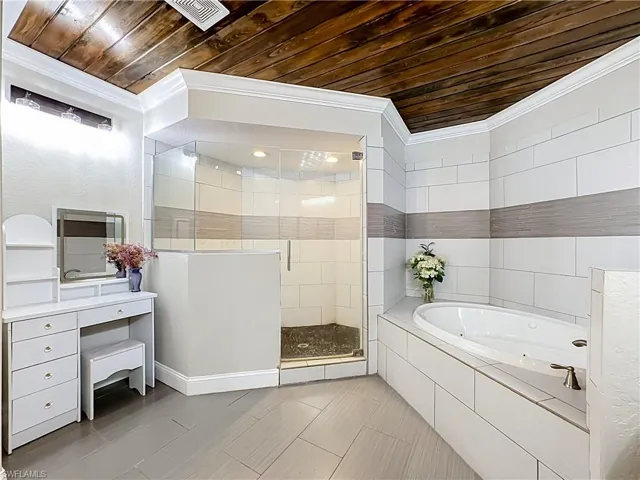 Master bathroom with wood ceiling