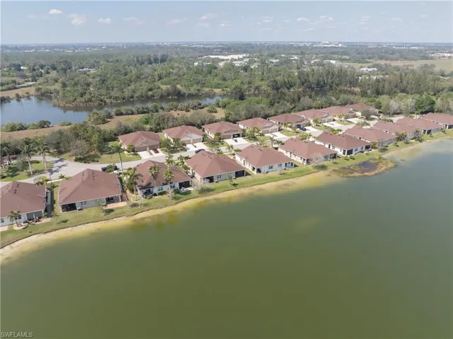 Bird's eye view with a residential view and a water view