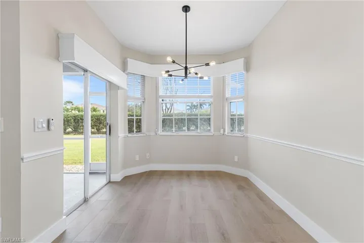 kitchen nook with upgraded lighting