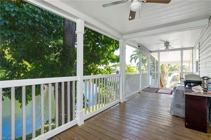 Screened Porch w/ view of Water Behind House