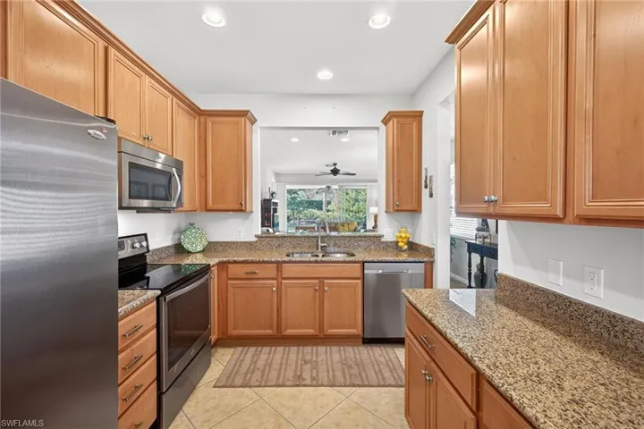 Granite- Wood Cabinets
