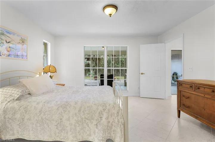 Bedroom featuring access to exterior