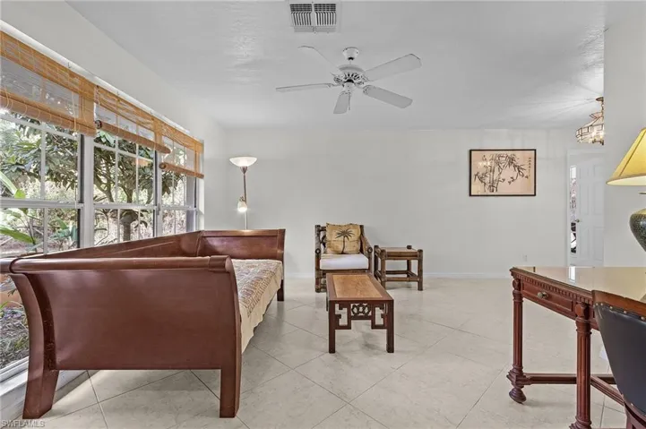Living room featuring ceiling fan