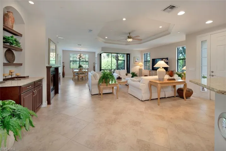 Fireplace with shelves and cabinets on leftside