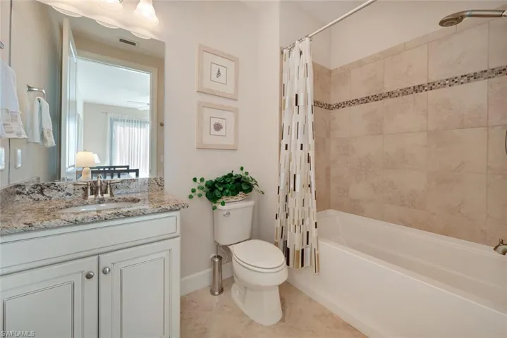 Guest Shower & Tub with wall tiling