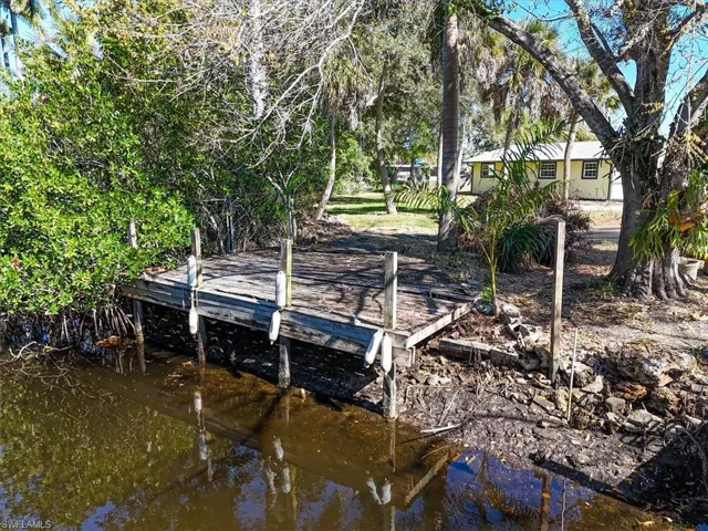 Dock featuring a water view