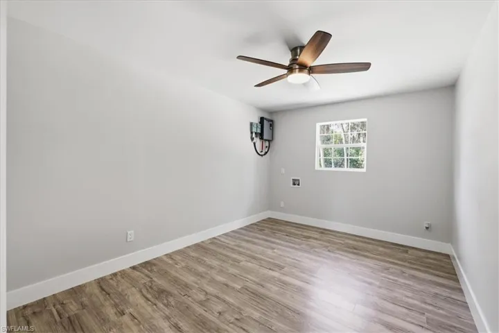 Unfurnished room 3 featuring light wood finished floors and ceiling fan