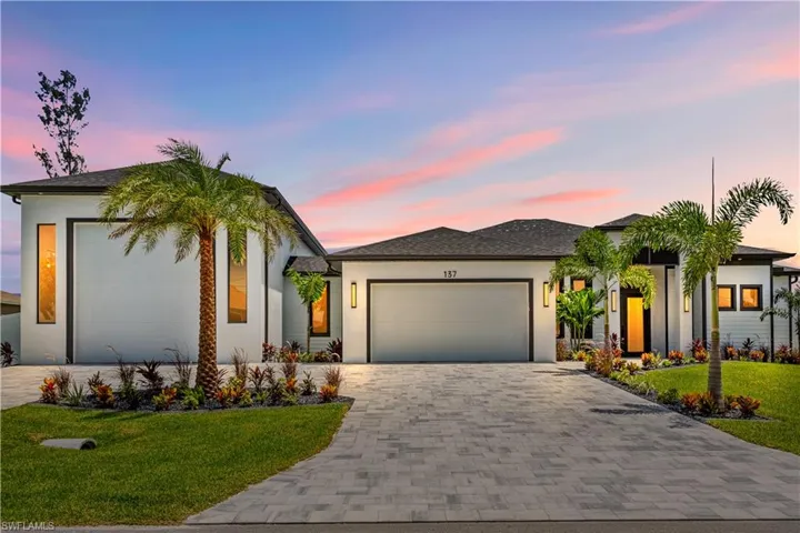 WELCOME to PINNACLE of SWFL LIFESTYLE in this BEAUTIFULLY DESIGNED 2024 NEW-BUILT EXTRA-LARGE OASIS!