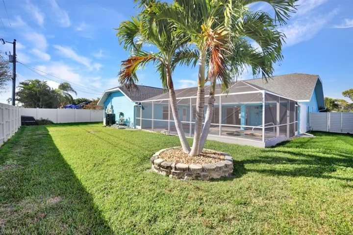 large backyard with fence on all sides