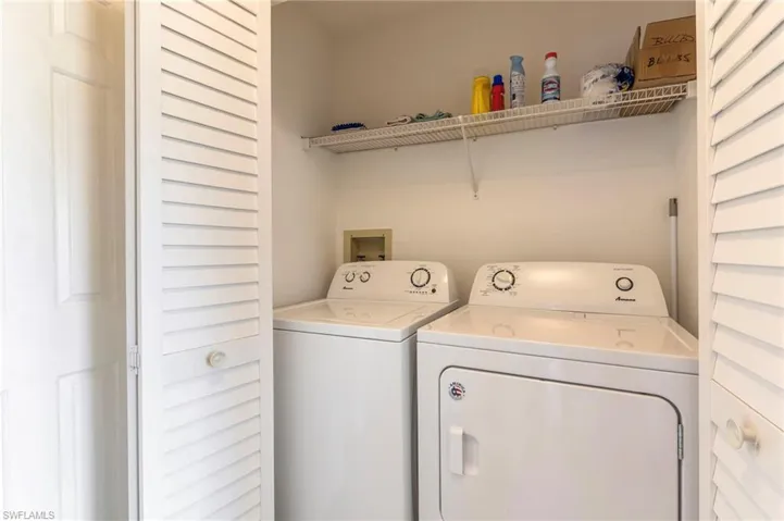 Laundry area with washer and clothes dryer