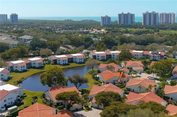 Aerial view of residential area with a large body of water