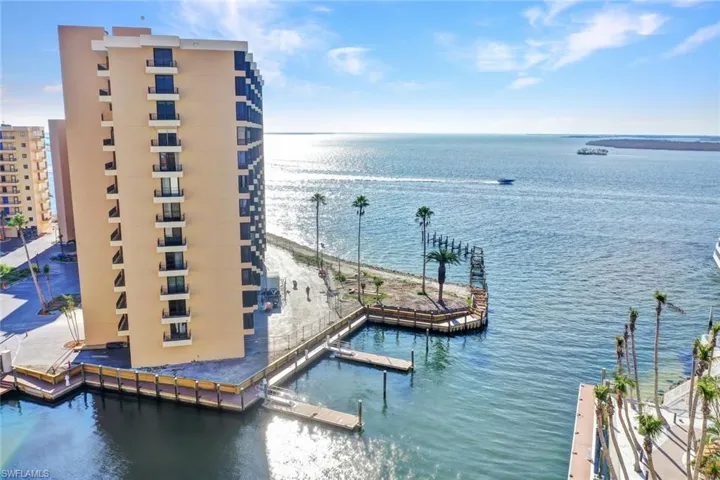 Property view of water featuring a dock