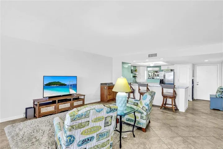Living room featuring light tile patterned flooring
