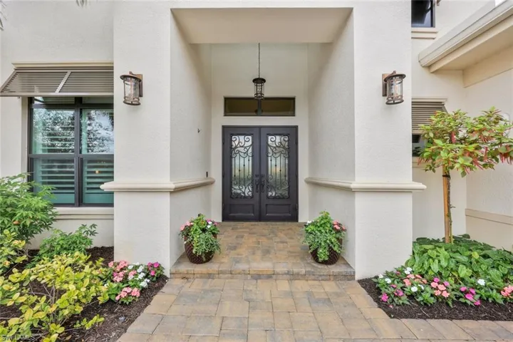 Stunning Double Iron Doors set the stage for what is to come...