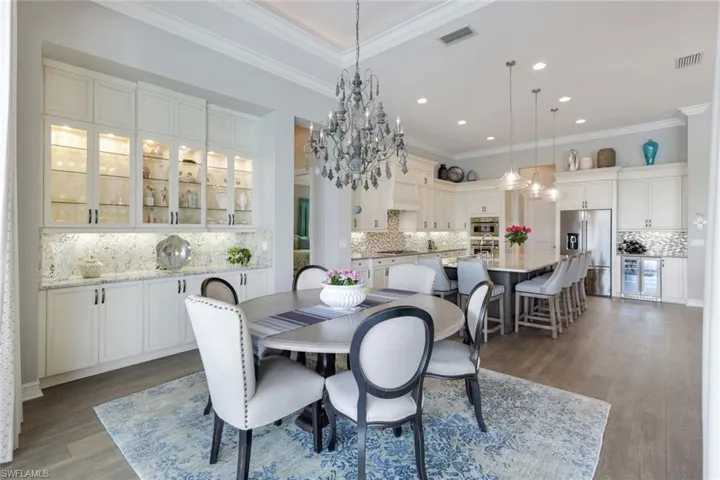 Stunning Built-ins provide even more storage, with glass display upper cabinetry