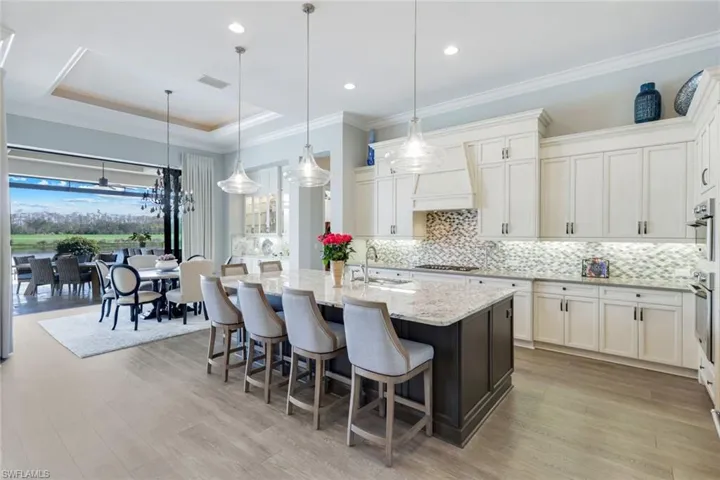 Seamless continuity from kitchen, to dining, to outdoor living
