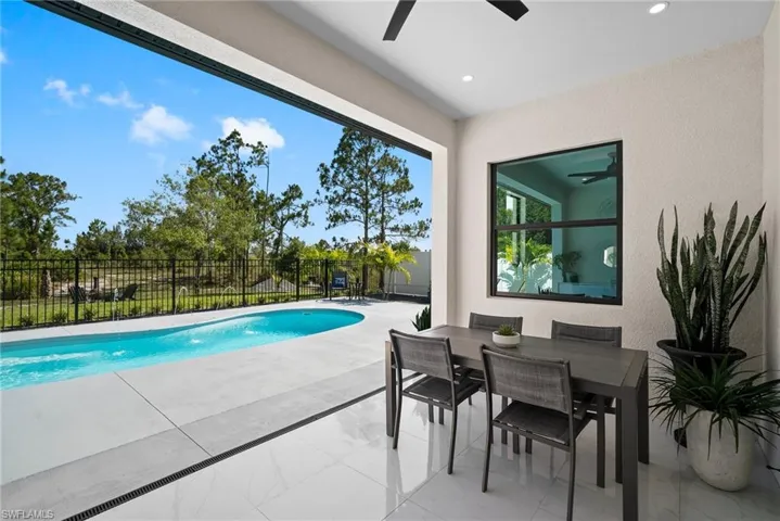 View of swimming pool with a patio area