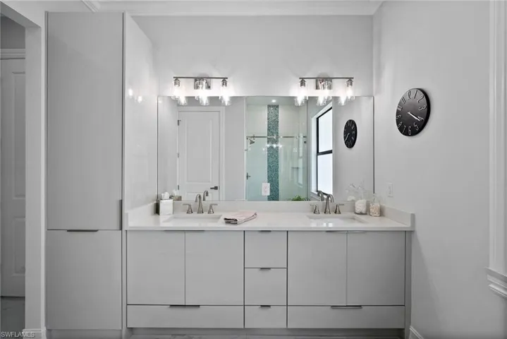 Bathroom featuring dual vanity