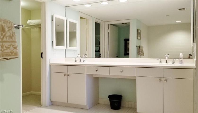 Spacious double sink vanity with dressing/make up area