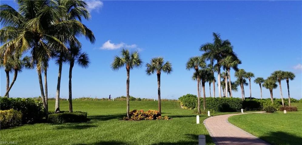 Private gated access to the Gulf Beach and Boardwalk along a paved walkway.
