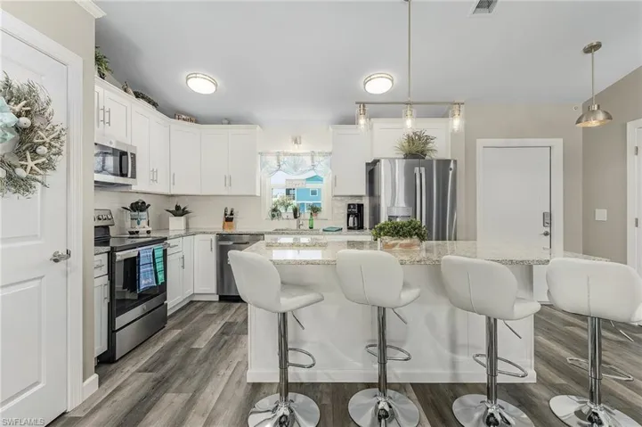All new kitchen with pantry on the left and breakfast bar.