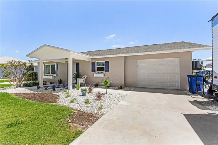 Street view of home with new entry.
