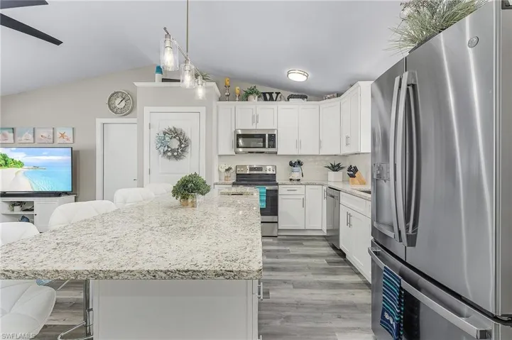 Granite counters and stainless appliances.