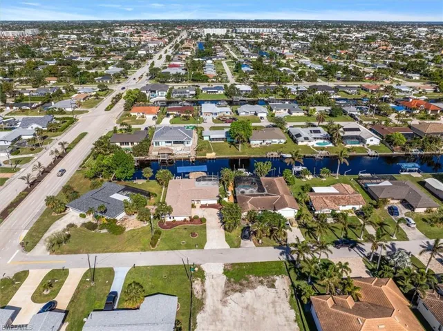 Aerial overview of property's location with nearby suburban area