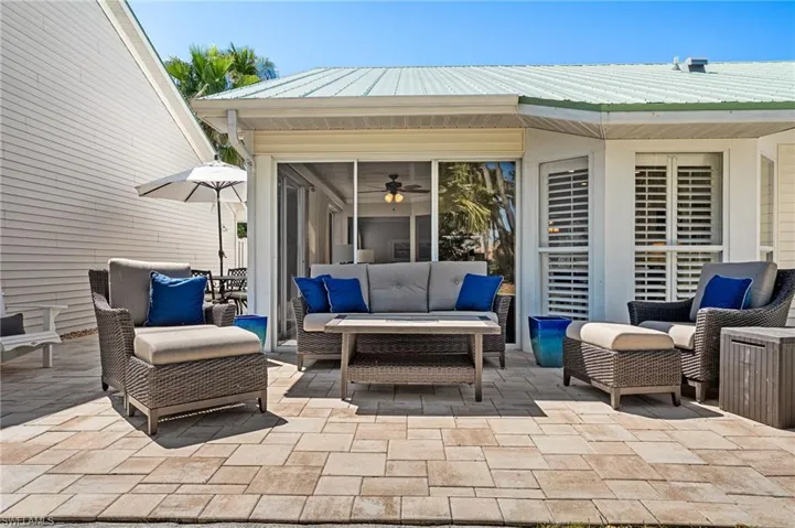 Amazing relaxing area off of the second living area.  All pavered deck to watch the golfers!