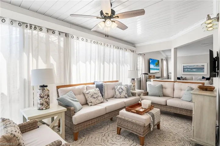 This is a second living area which is completely enclosed with glass sliders.