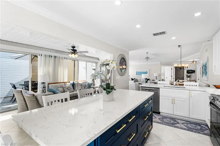 Custom cabinetry, quartz countertops, oversized island. Stainless Steel appliances.