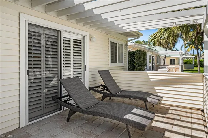 This patio is outside the primary suite.
