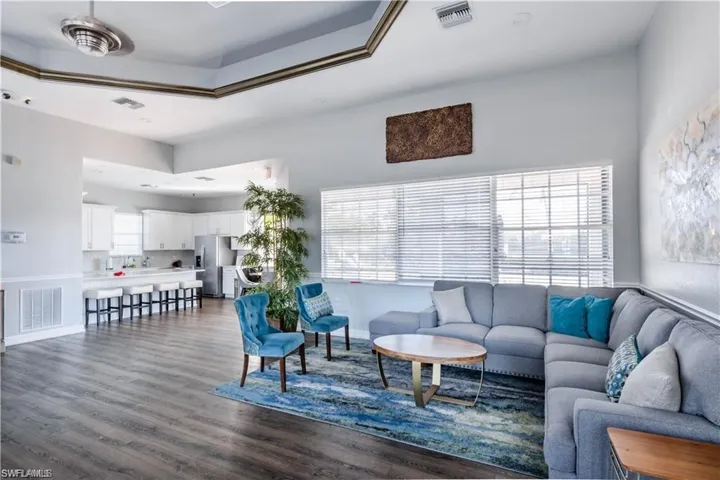 Living room featuring dark wood-type flooring