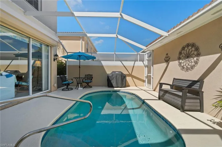 This home has a courtyard pool and a detached garage. The pool is in the courtyard, and the garage is detached from the house.