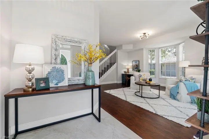Welcoming foyer leads to bright and sunny living space