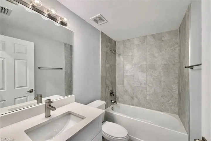Bathroom with  shower combination and vanity