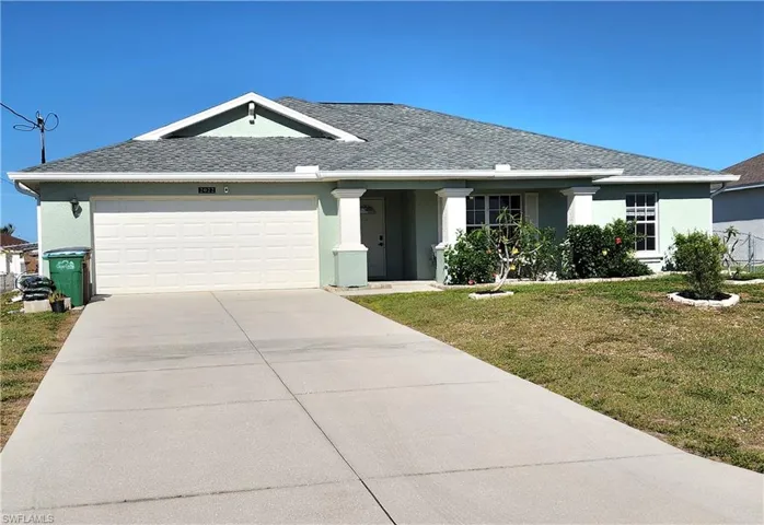 Front elevation with driveway.