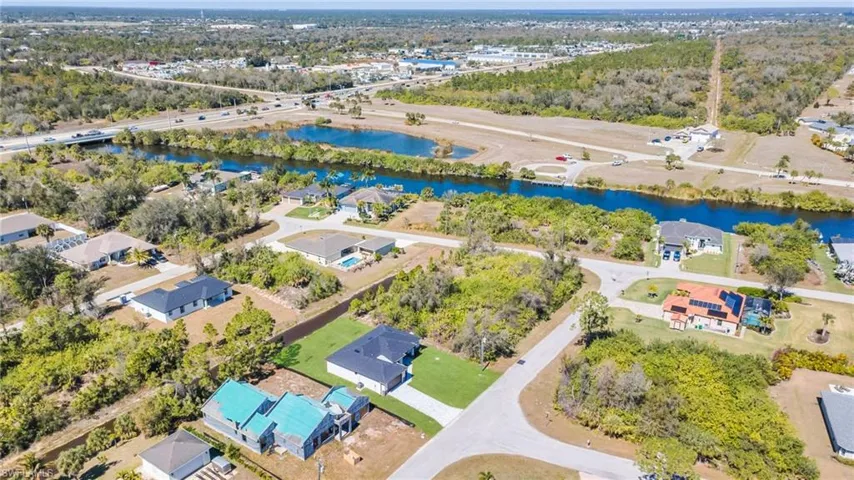 Aerial view of residential area with a nearby body of water