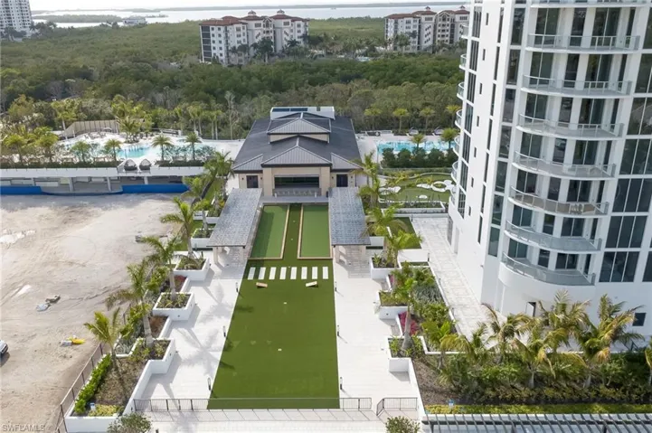 Aerial view of  bocce, cornhole, cafe, and building  II will be on the left
