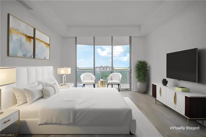 Bedroom featuring access to outside, light wood-style flooring, and floor to ceiling windows
