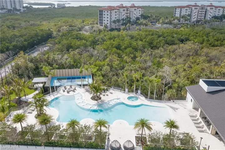 Aerial view of pool 2, fire pit, and pickleball