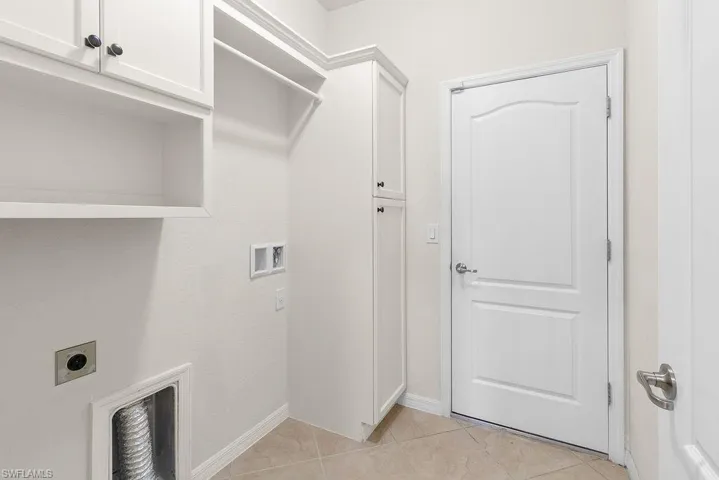 Custom built-in storage in laundry