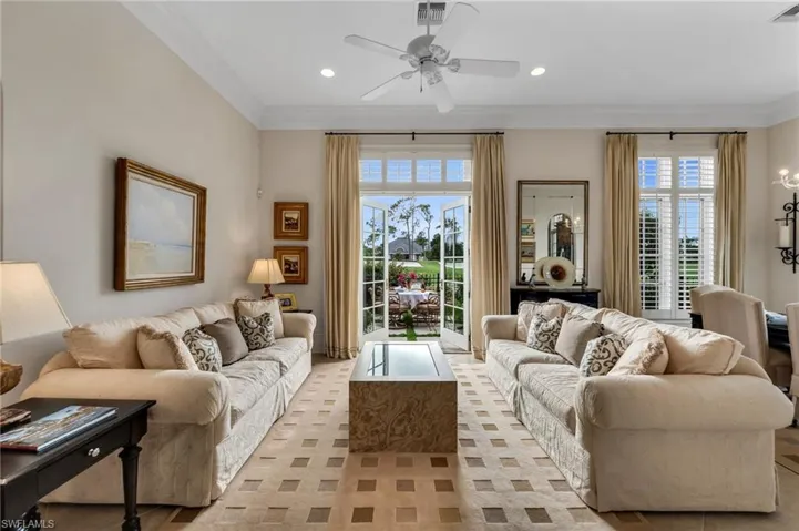 The light-filled living room has French doors that open out to your private garden setting, with views to the Clubhouse and the 18th Hole.