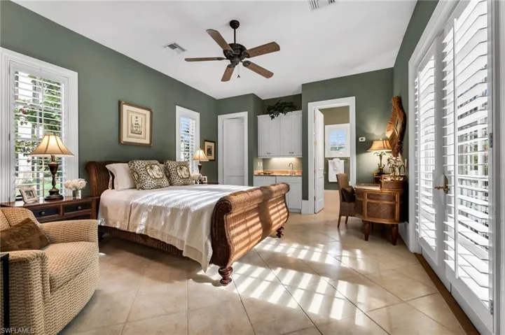 Cabana guest room with kitchenette and French doors that open out to the courtyard pool.  Your guests will never want to leave!