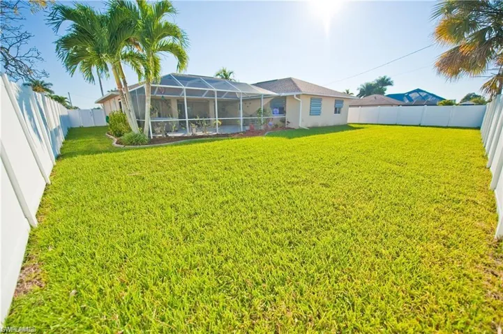 Talk about a BIG backyard. Wow! Call to schedule a showing now!