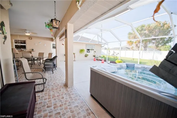 A huge screened in lanai and an additional covered space