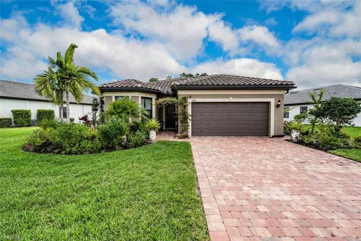 6828  Winding Cypress  DR, Naples, FL 34114