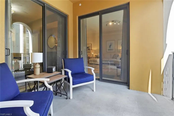 Sitting room featuring carpet