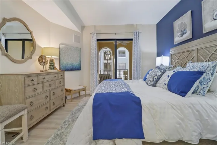 Bedroom with light hardwood / wood-style floors