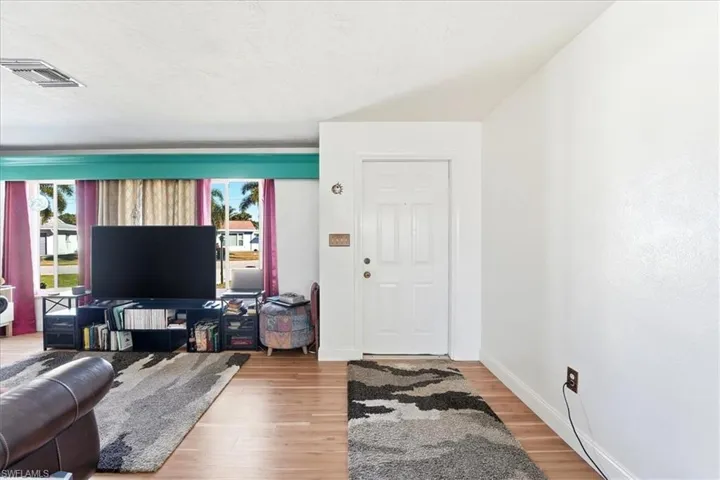 Living area featuring light wood-style flooring